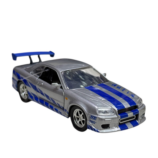 Jada 1:32 Rápido y furioso BRIAN’S NISSAN SKYLINE GT-R (R34) (Gris)